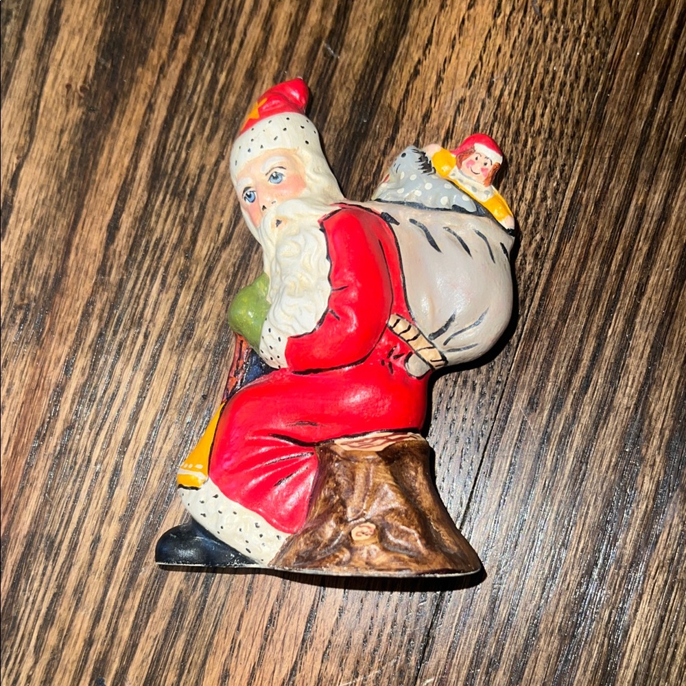 Vaillancourt 15th Annual Starlight, Father Christmas Sitting on Log